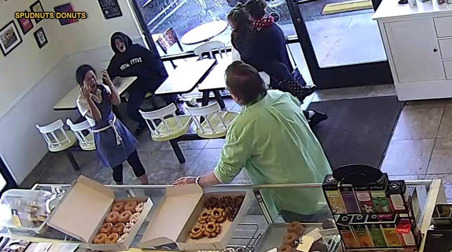 Homeless woman throws hot coffee in doughnut shop owner's face