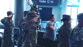 Nashville airport travelers stop to sing national anthem for children of fallen service members, viral video shows