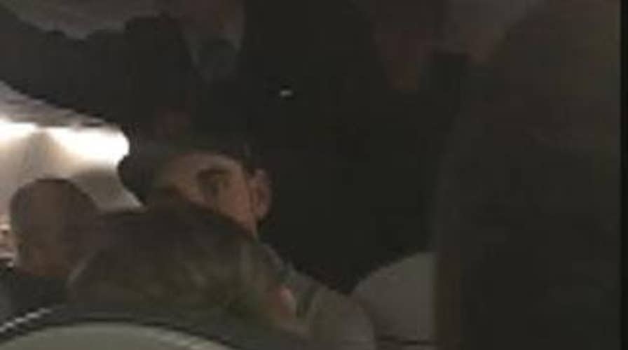 Airplane passenger suffer from seizure