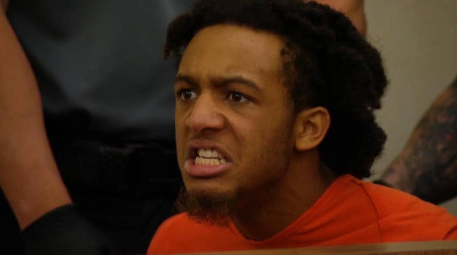 Double murder suspect enters court screaming, denied bond