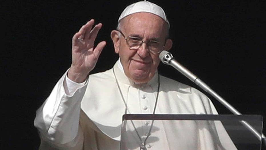 Vatican spokesman, deputy resign suddenly amid overhaul by Pope Francis