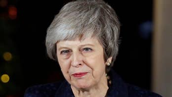 British PM Theresa May survives no-confidence vote despite Brexit chaos