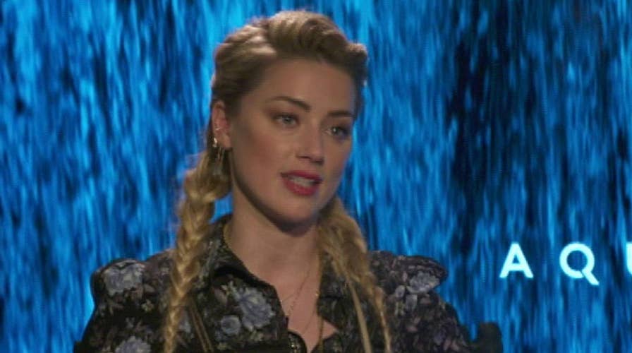 Amber Heard talks superhero roles for women