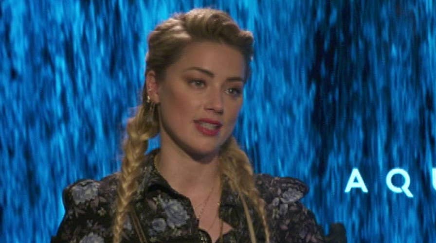 Amber Heard talks superhero roles for women