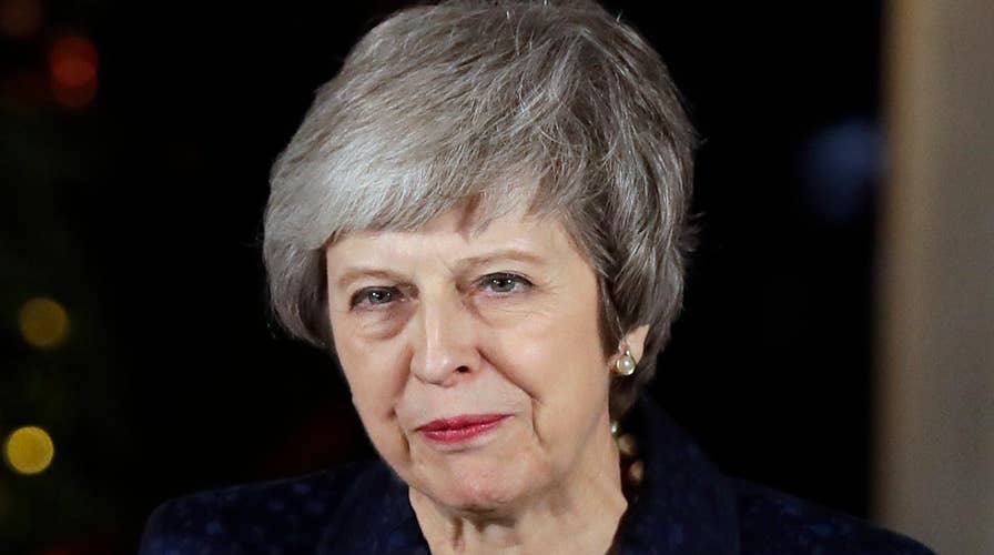 Theresa May survives no-confidence vote