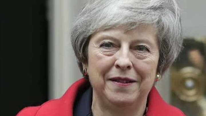 British PM May survives no-confidence vote