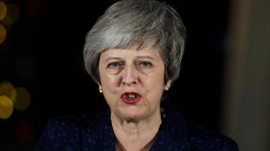 UK PM May survives no-confidence amid Brexit turmoil