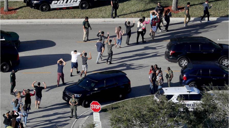 Parkland shooting commission recommends arming teachers