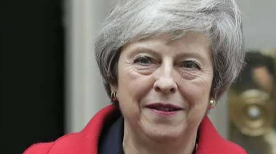 British PM May survives no-confidence vote