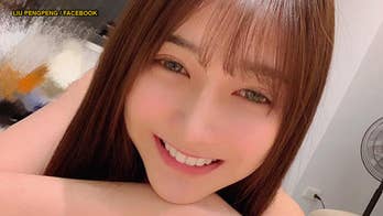 Woman called Taiwan's 'most beautiful fishmonger' after photos pop up online