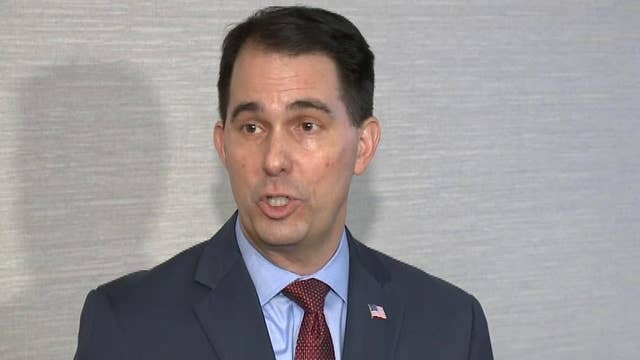 Gov. Walker slams 'hype and hysteria' over new laws