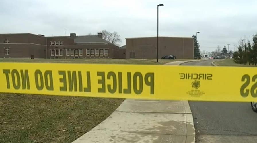 Police confront teen gunman at Indiana middle school