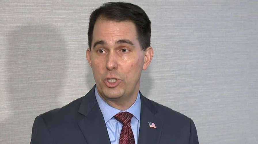 Gov. Walker slams 'hype and hysteria' over new laws