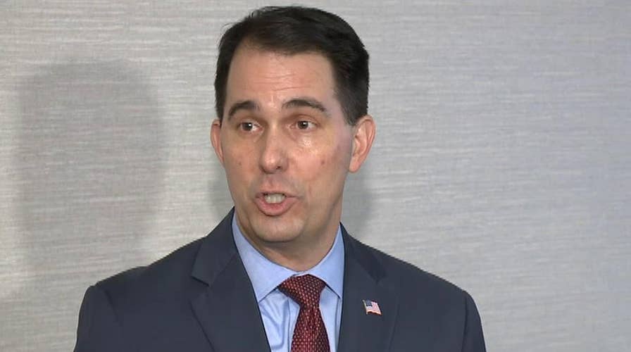 Gov. Walker slams 'hype and hysteria' over new laws