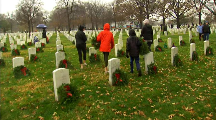 Inspired volunteers help with 'Wreaths Across America'
