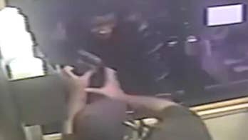 Burger King employee fights off armed robber at drive-thru window
