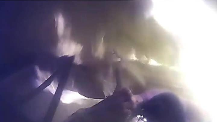 Police save man from car engulfed in flames