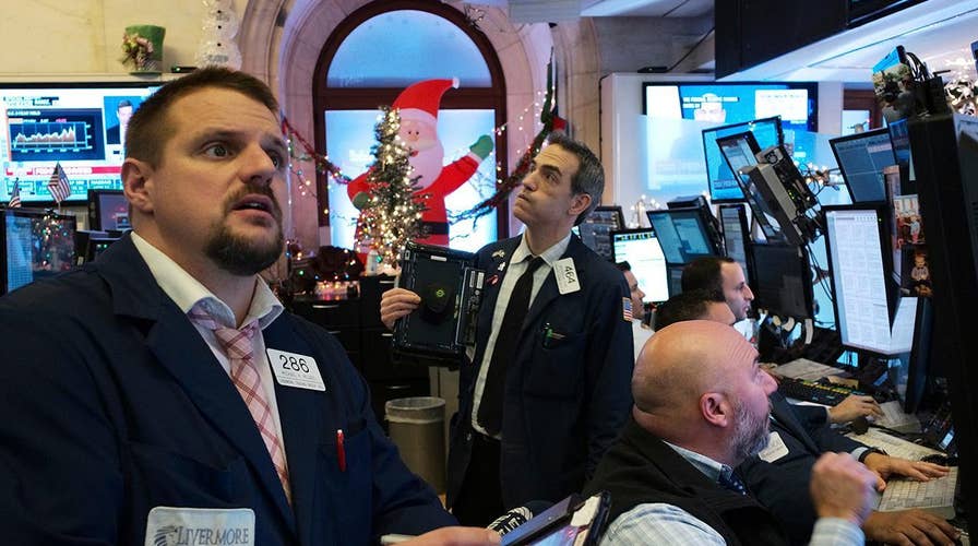 Stocks drop after Federal Reserve raises interest rate