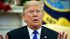 Trump refuses to back government funding deal, presses anew for border wall money