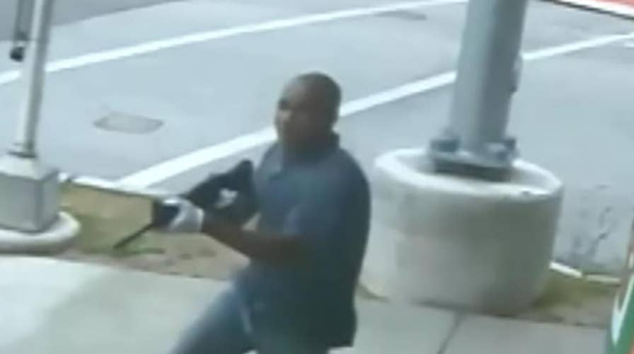 Police search for suspect in store shooting