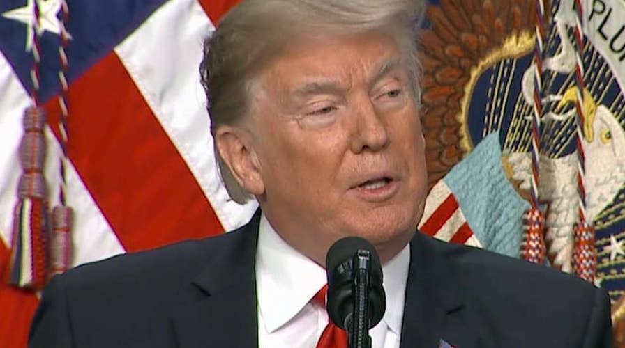 Trump insists walls 'work better than anything'