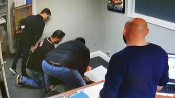 Man’s near-fatal heart attack caught on car dealership camera