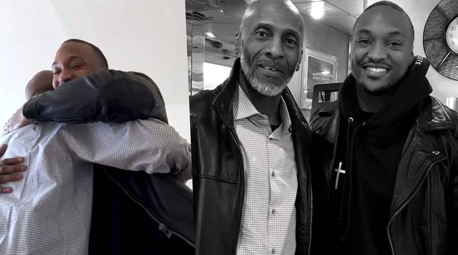 Pastor surprises church with emotional embrace of his biological father
