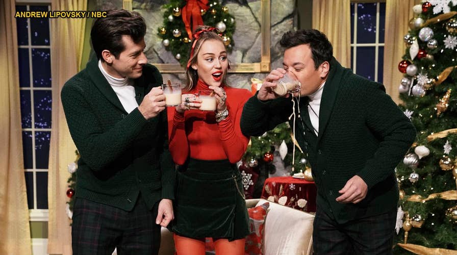 Miley Cyrus says she can buy her 'own damn stuff' in feminist take on 'Santa Baby'