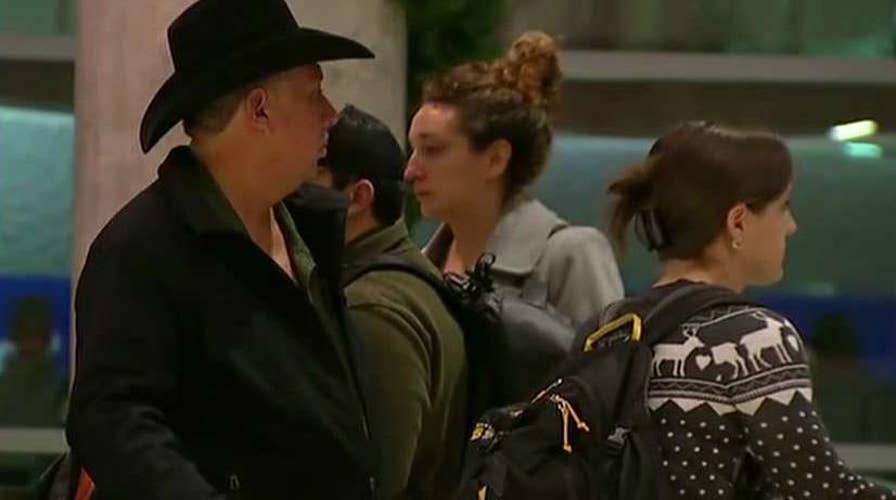 Flight delays mounting as storms disrupt holiday travel