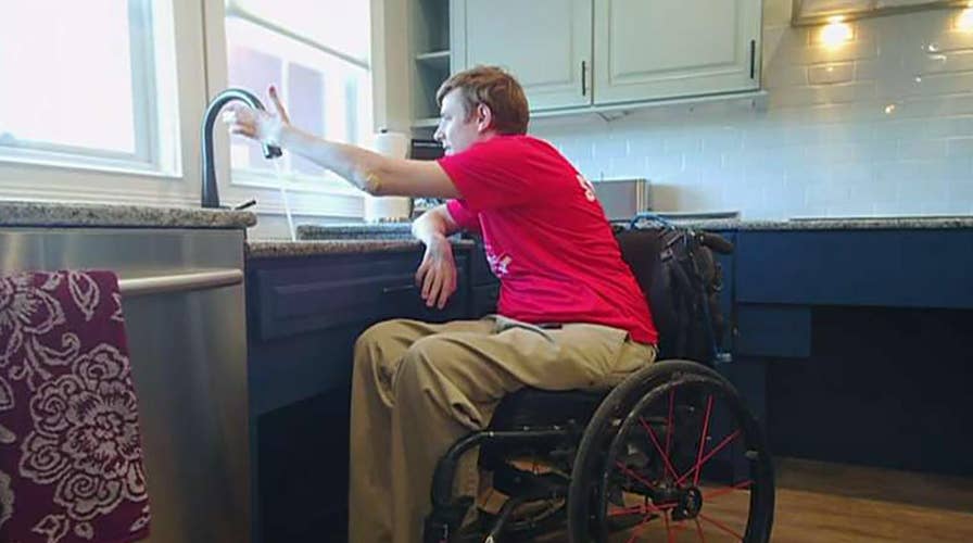 Wounded warrior gets Christmas surprise: Tunnel to Towers gives paralyzed veteran a mortgage-free smart home