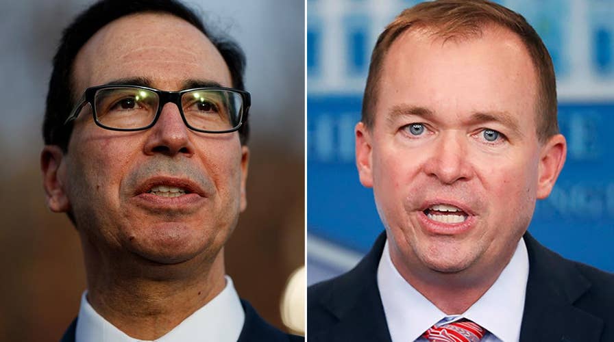 Trump administration officials seek to calm investors' jitters amid wild swings on Wall Street