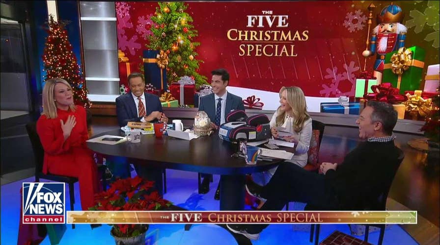 "The Five" exchange Secret Santa gifts.