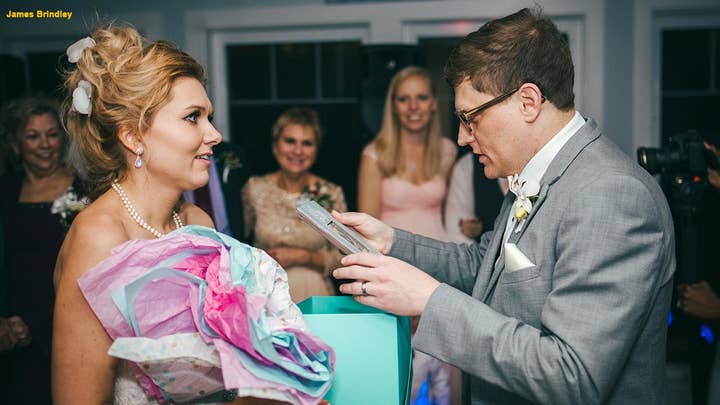 Bride surprises groom with pregnancy announcement on their wedding day