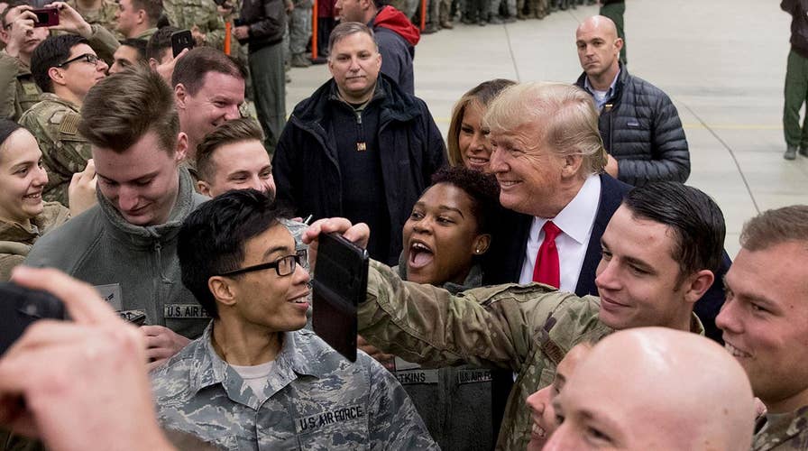 President Trump greets U.S. troops stationed at Ramstein Air Base in Germany