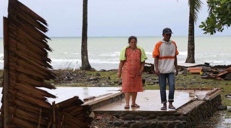 Indonesian officials raise threat level as volcano threatens to trigger second tsunami