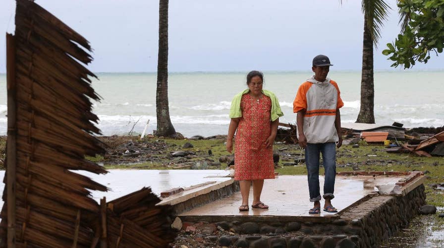 Indonesian officials raise threat level as volcano threatens to trigger second tsunami