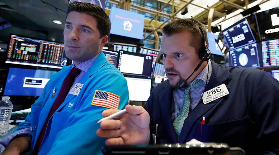 Whiplash for investors on Wall Street; consumer confidence sinks in December