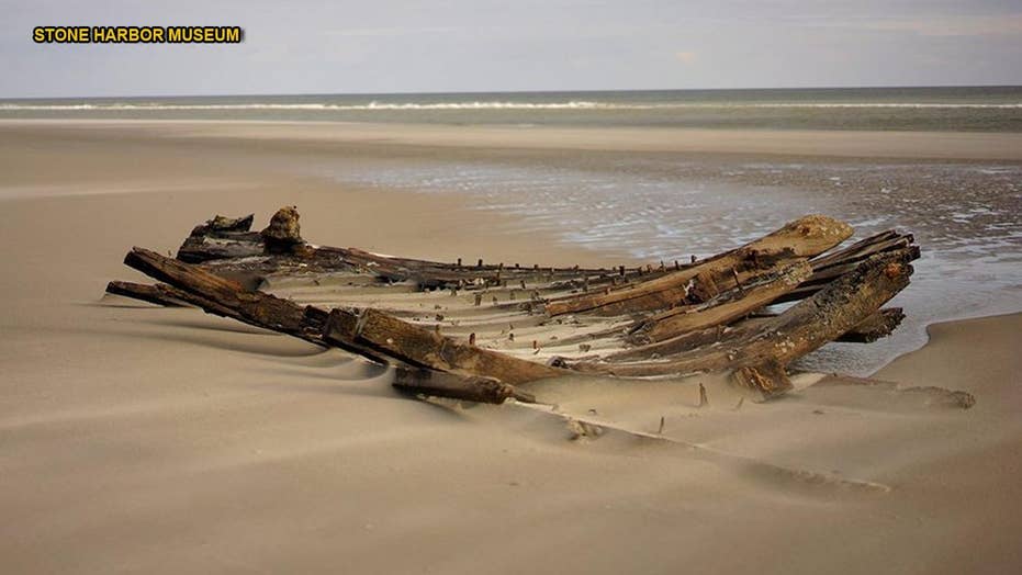 Mysterious, century-old shipwreck unearthed on Jersey shore