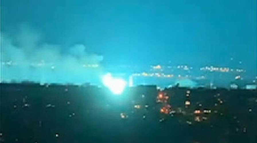 Transformer fire at Con Edison facility turns night sky over New York City an eerie blue-green