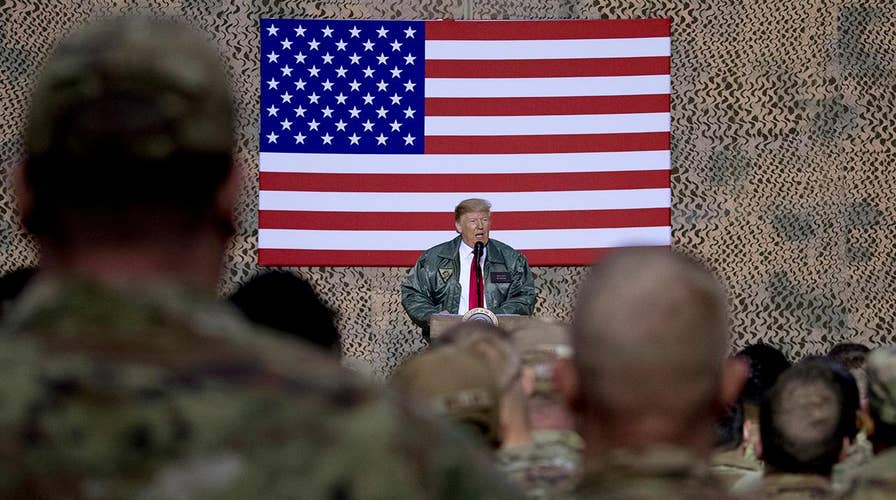 Some Iraqi lawmakers demand US troop withdrawal following President Trump's surprise visit