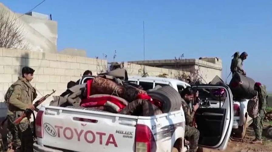 Hundreds of US troops in potential danger as Syrian forces move to outskirts of Kurdish-held city captured from ISIS