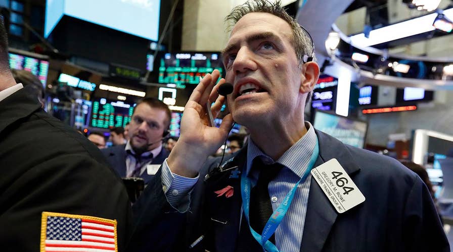 Massive swings on Wall Street after worst Christmas Eve drop in history is followed by biggest single-day point gain
