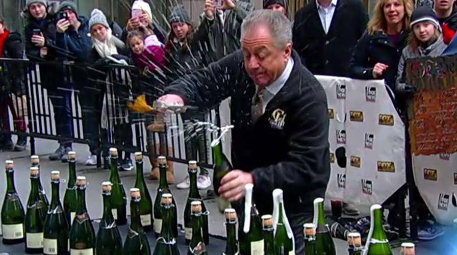 Bottle popper! Butch Yamali looks to break the world champagne sabering record of 66 bottles in 60 seconds