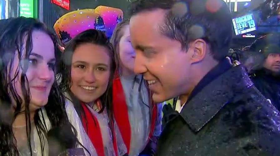 What's the secret to waiting over 16 hours in Times Square for the ball to drop on New Year's Eve?