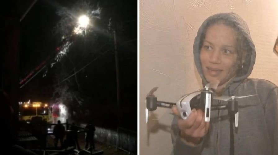 Barefoot woman reportedly 'hooting' like an owl gets stuck in tree trying to retrieve a stuck drone