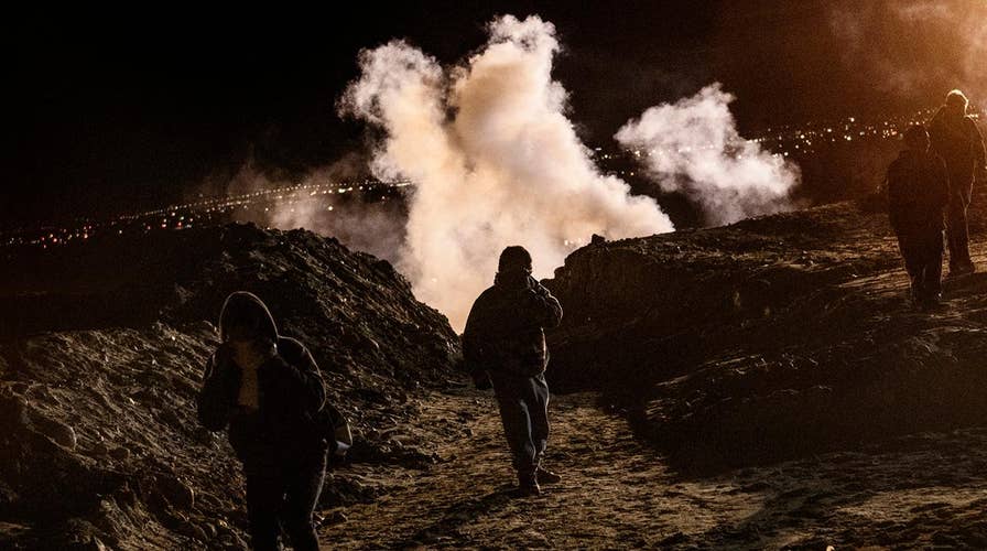 US officers fire tear gas and pepper spray as 150 rock-throwing migrants violently engaged CBP after crossing the border