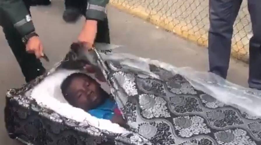 Migrants discovered hidden inside mattresses