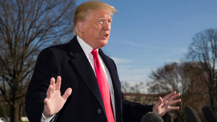 Trump makes remarks after a working visit to Camp David, says the wall will be made out of steel being less obtrusive