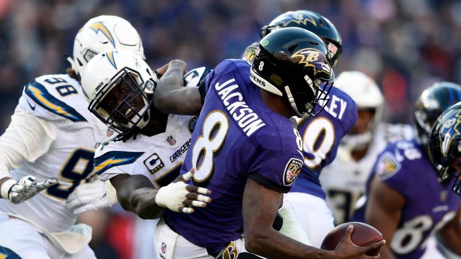 ravens chargers fans fight