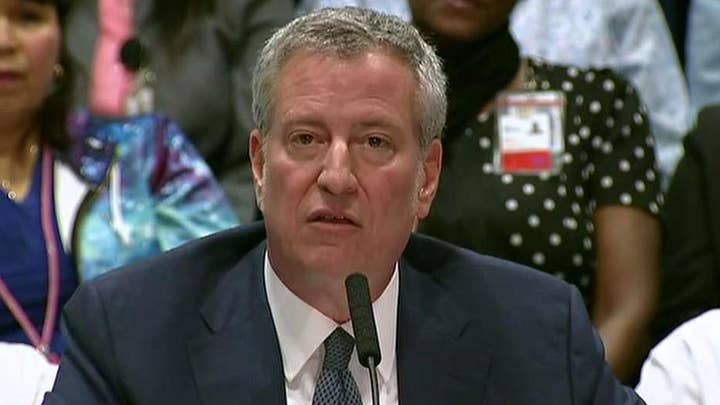 Mayor Bill de Blasio announces health care coverage for all New York City residents, including illegal immigrants